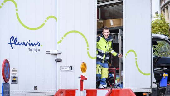  Technician in an open door of a van