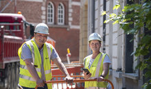Fluvius employees on a construction site